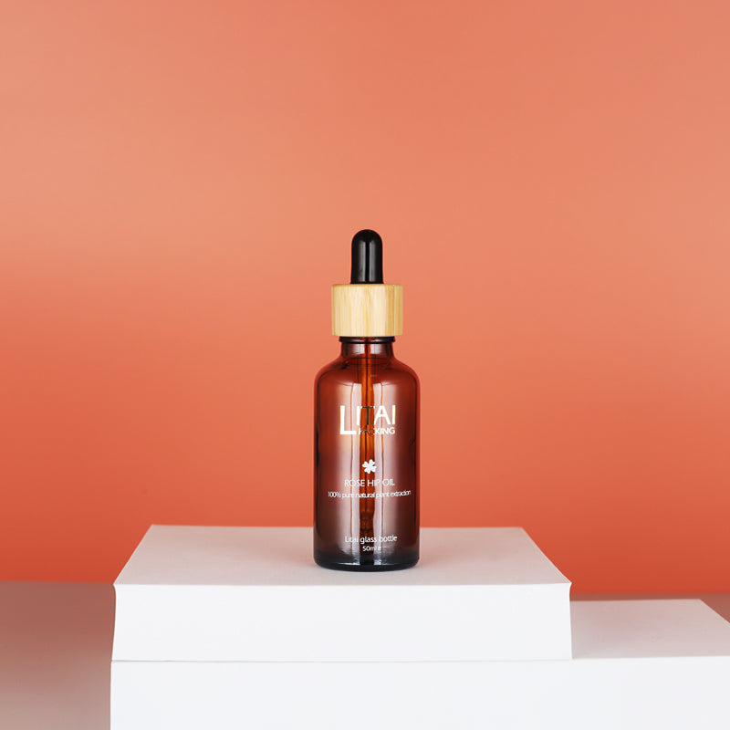 Skin Care Glass Packaging Essential Oil Bottle with Bamboo Wood Caps