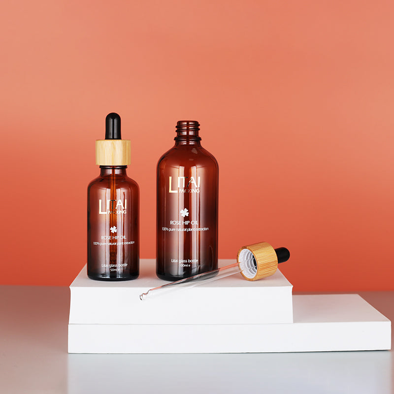 Skin Care Glass Packaging Essential Oil Bottle with Bamboo Wood Caps