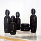 30ml 50ml 100ml luxury skincare packaging black cream jar bottle with stone shape cap